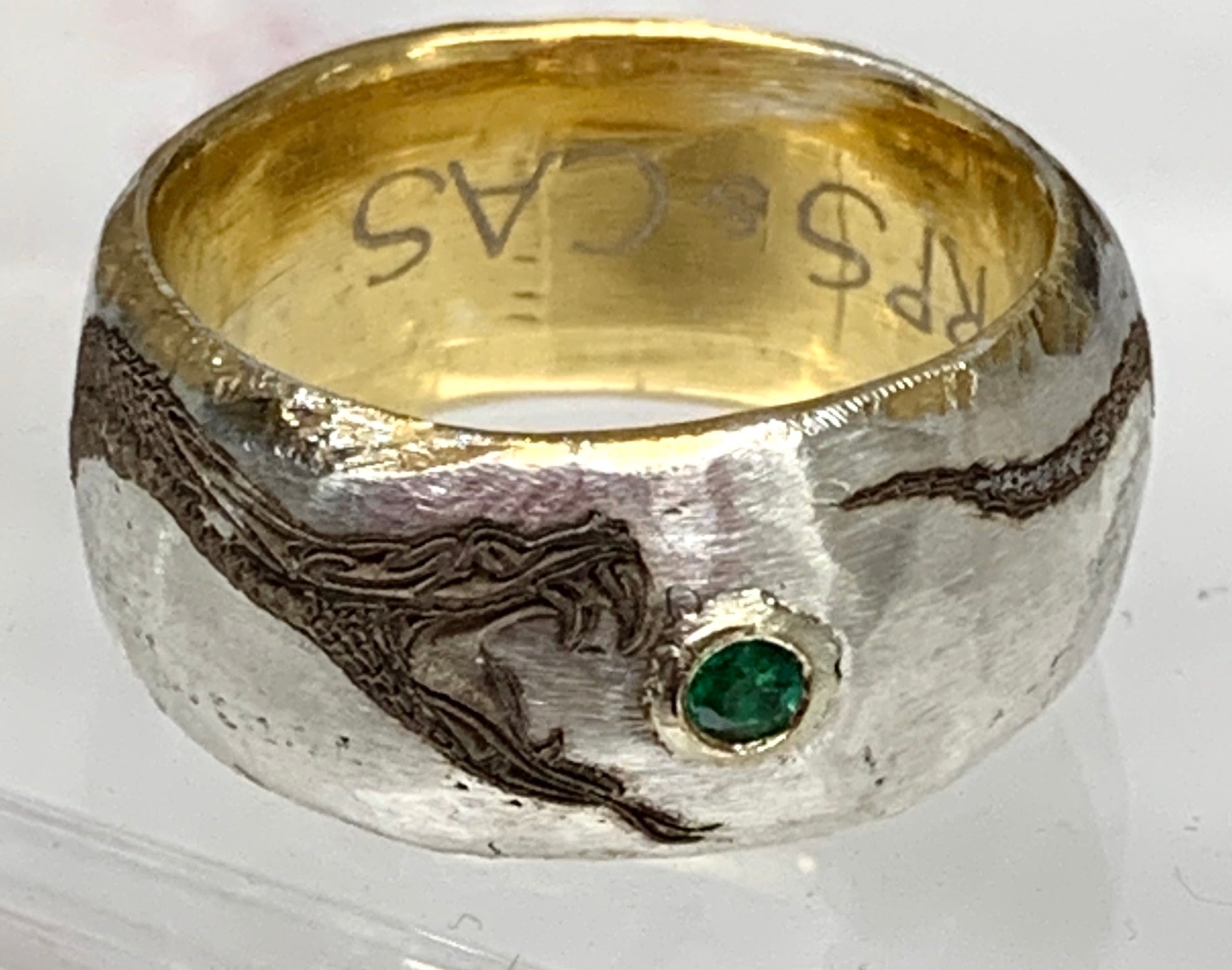 Silver Handcrafted Wedding Band with Custom Engraved Serpent and Green Emerald
